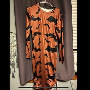 Orange and black bat dress size medium long sleeve